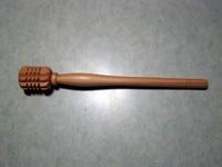 A wooden beater called batidor for a hot tablea tsokolate